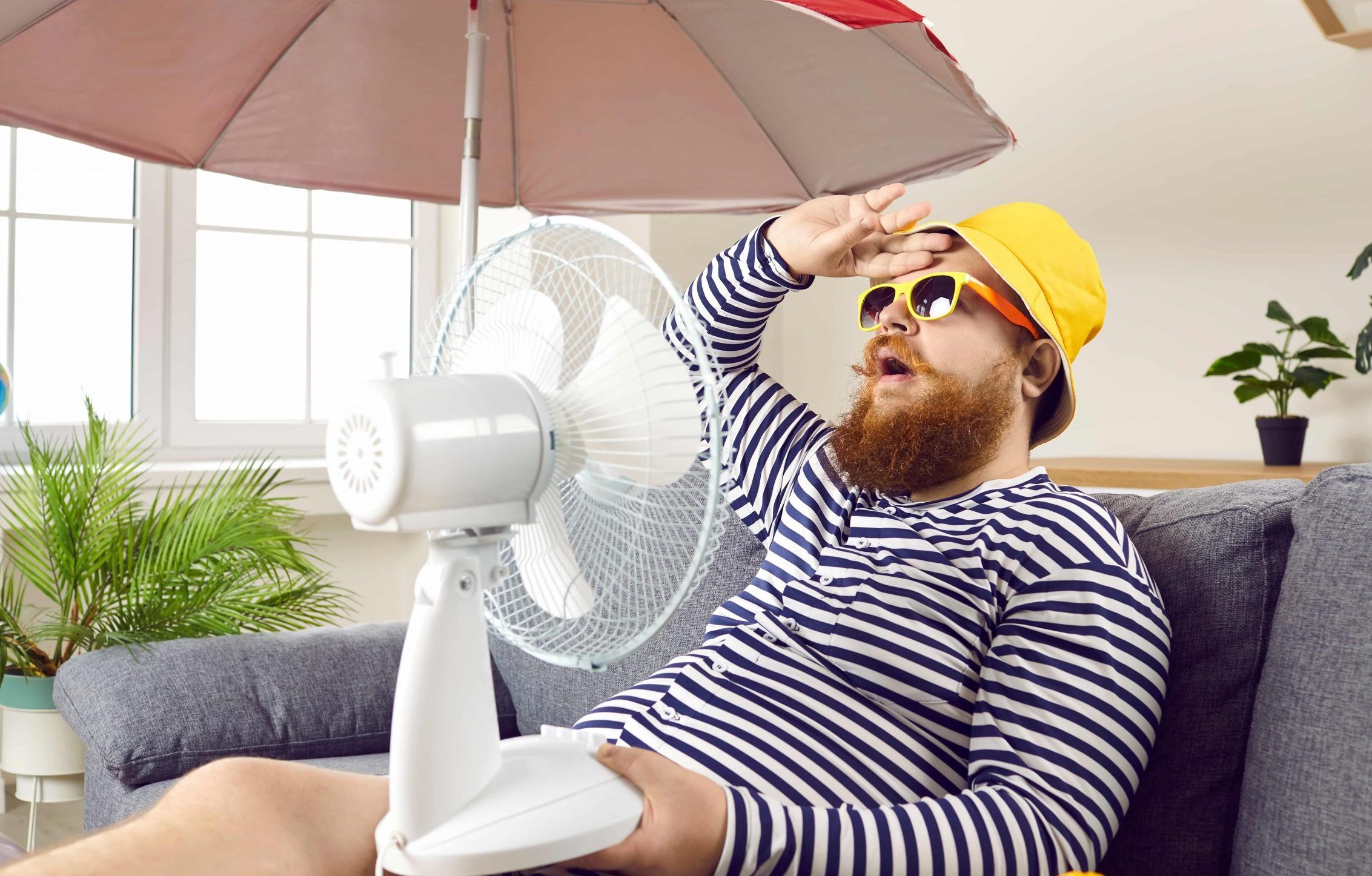 bearded man sweating during heatwave